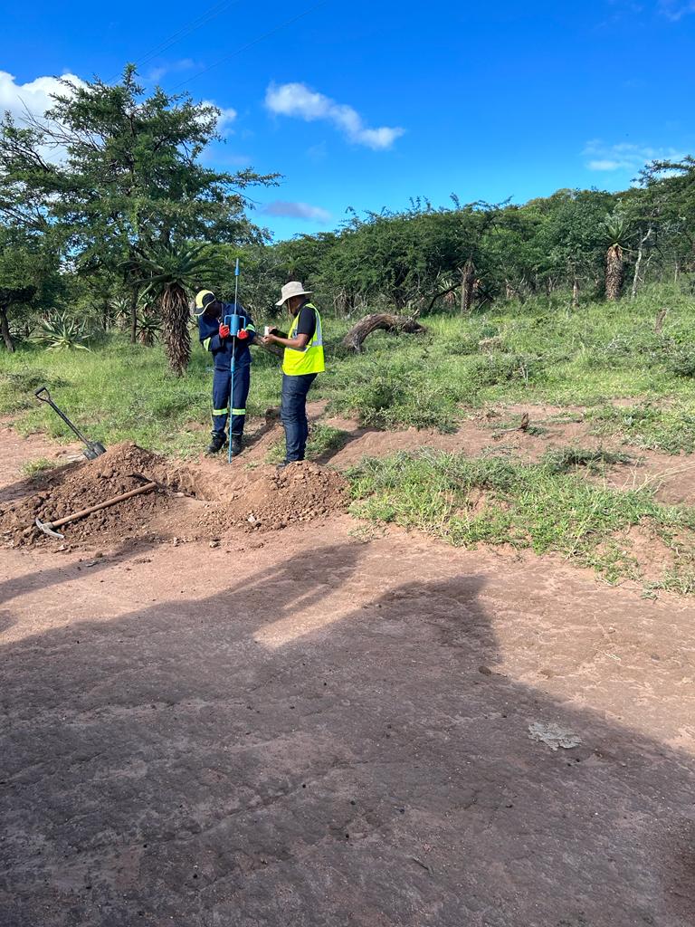 one of the employeees of ml geo consultation Engineers doing field work